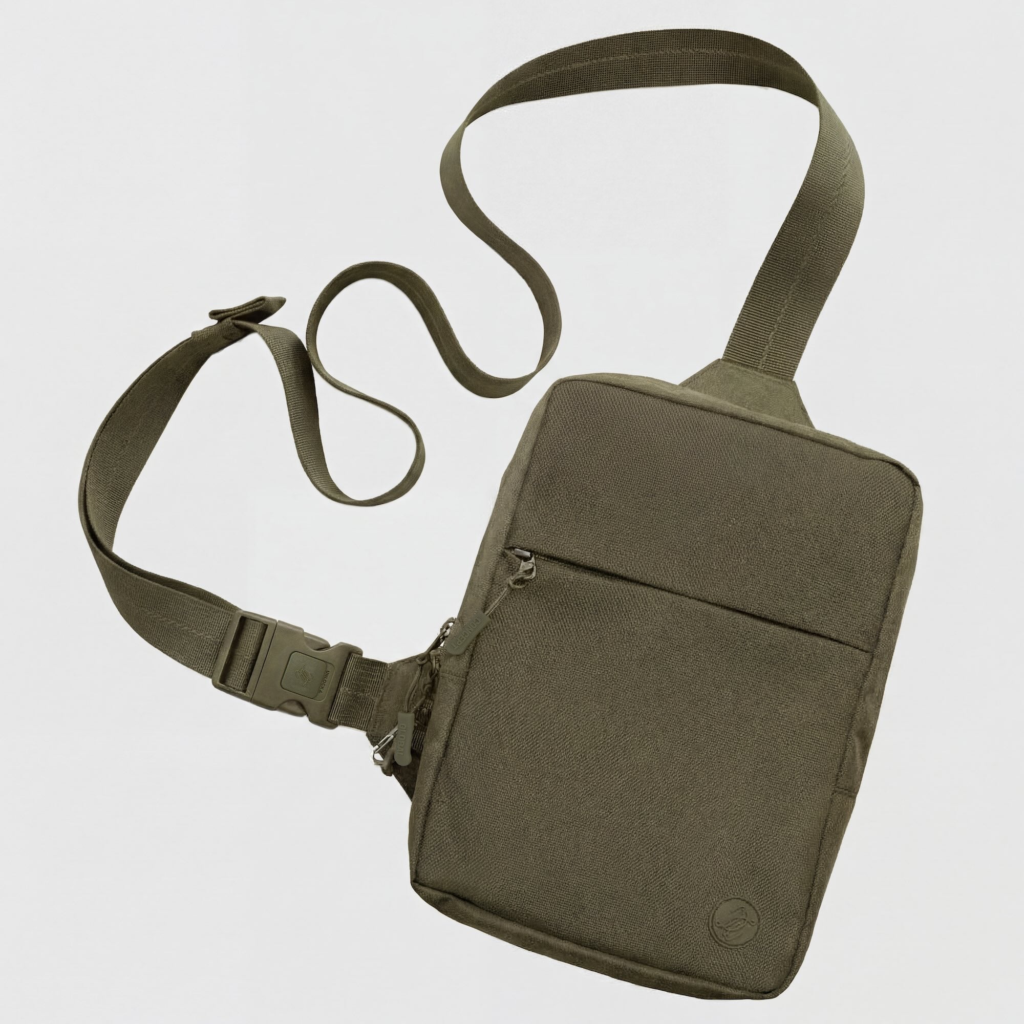 Green shoulder bag with a strap on a light gray background